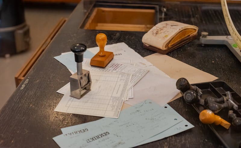 Official documents and stamps on a desk